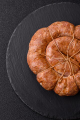 Grilled sausage in the shape of a spiral or snail, from chicken or pork. Spiral or snail sausage