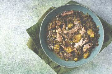 chakapuli, Georgian dish, stewed meat with herbs and tkemali, in white wine, homemade, no people,