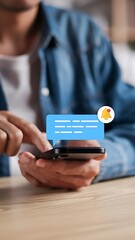Person using smartphone with notification bubble and bell icon, close-up