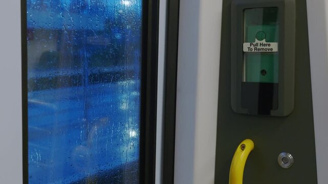 Green alarm emergency button on train in england uk