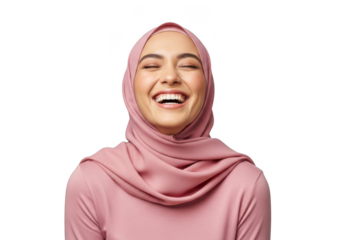 A joyful young woman wearing a pink hijab and matching top laughing heartily with her eyes closed isolated on transparent background