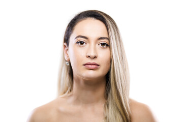 Fototapeta premium Portrait of a confident woman with long blonde hair looking at the camera against a clean white background for versatile stock use.