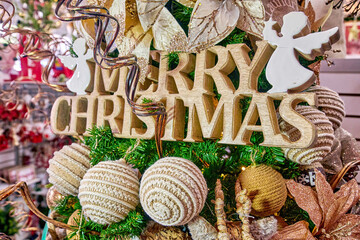 Handmade Christmas ornaments, crocheted and wooden, displayed with festive decorations, showcasing intricate designs and textures, perfect for holiday celebrations and seasonal decor