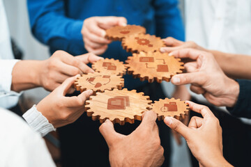 Collaborative Management Strategies with Wooden Gears Illustrating Teamwork and Process Improvement in Business Operations. Amity