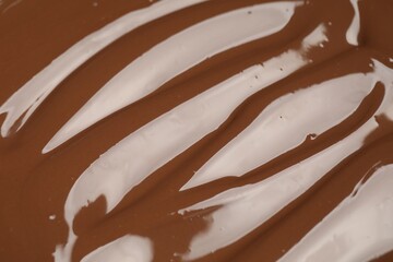 Tasty melted chocolate as background, closeup view