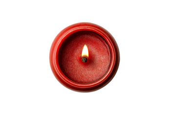 Red scented candle with burning flame, top view