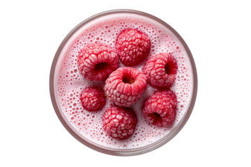 Frozen Raspberries floating in frothy pink drink
