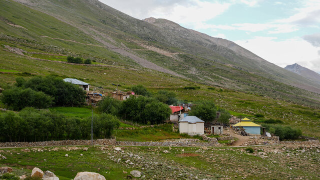 Remote village in Astore Valley - Scattered homes and grazing land in a high-altitude valley near Chilam Choki, Gilgit-Baltistan, Pakistan