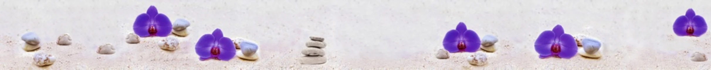 Fotobehang Zen Stenen Panoramic composition of purple orchids and stacked zen stones on sand  © MonTeArt