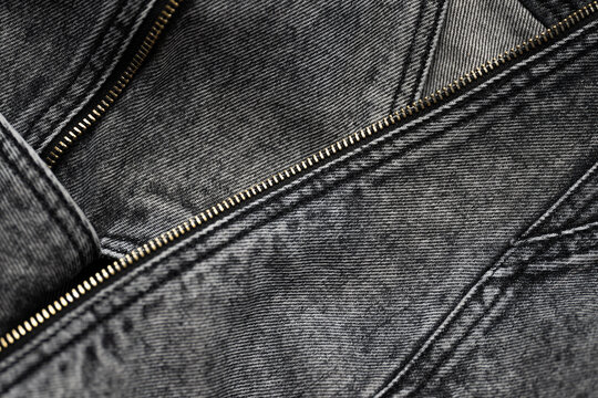 Denim texture pattern jacket with zipper background. Fashion, style and textile concept.