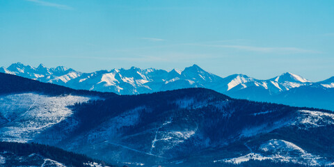 High Tatras mountains from Barania Gora hill in winter Beskid Slaski mountains in Poland