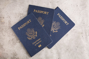 there are many US passports on a light background