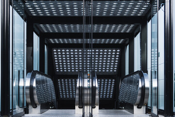Modern Copenhagen Metro Station Entrance with Escalators and Glass Architecture