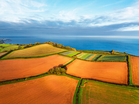 Colours of autumn Fields and Farms over Sheldon from a drone, Torbay, Devon, England