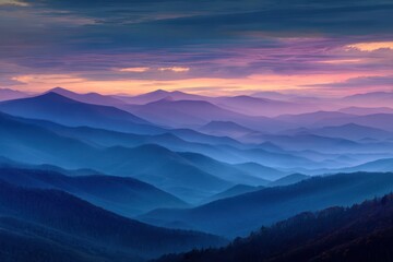 Fototapeta premium Majestic Blue Mountains Under a Vast Blue Sky at Sunrise with Gentle Morning Fog