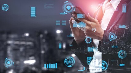 A business professional engages with a smartphone amidst a digital interface projecting various data metrics and statistics in a modern cityscape at night. Xenic - Powered by Adobe