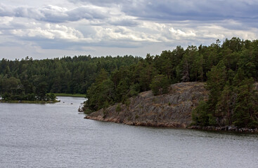 Stone cliffs of Scandinavia. Shores of the islands of the Stockholm archipelago, Sweden.