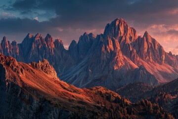 Naklejka premium Stunning Alpine Vista: Golden Evening Glow on Dolomites Peaks in Summer Splendor