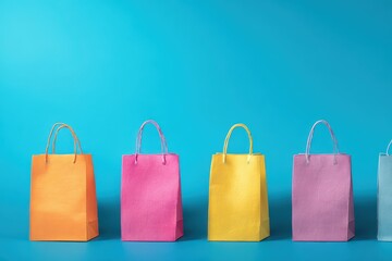 Trendy Shopping Scene: Small Paper Bags on a Vibrant Blue Backdrop for Modern Commerce and Fashion Marketing