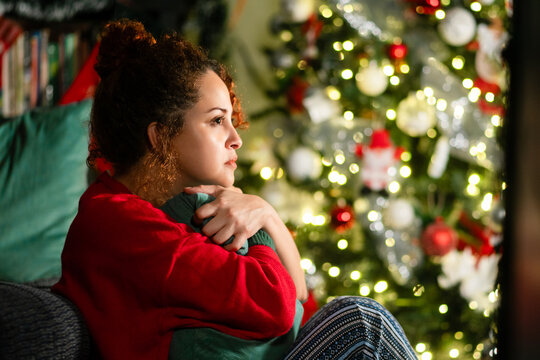 Woman feeling lonely at christmas contemplating future