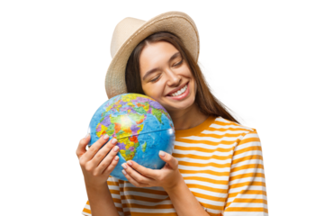 Smiling young traveler holding a globe with warmth, showing her love for exploring the world