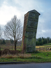 An old wooden fire tower in a small village in Central Europe.