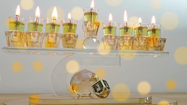 Hanukkah menorah,  Dreidel and effect Bokeh. Video for Jewish holiday Hanukkah. Israel, Jerusalem, 2025