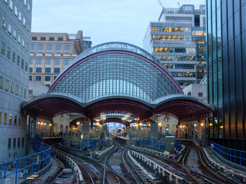 London, England, UK - October 30, 2025: Docklands Light Railway train approaching Canary Wharf station