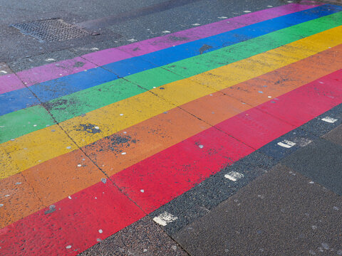 Gay and lesbian LGB rainbow flag colours at a pedestrian road crossing in Camden Town, London, UK