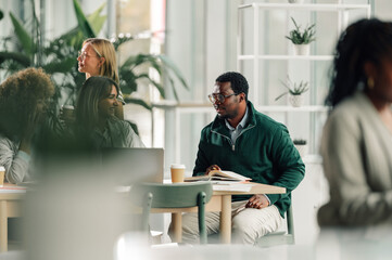Diverse business professionals collaborating in a modern office