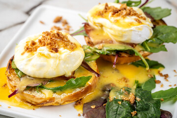 Gourmet poached egg bagels with creamy yolk