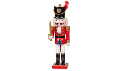 Nutcracker figure standing guard with a sword in a festive setting during the holiday season in a room. Isolated on transparent background, png