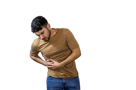 Young man suffering from abdominal pain on white background. PNG