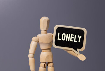 Homeless person with blanck cardboard. Focused on cardboard.