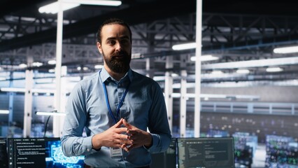 Data center manager presents AI technology to shareholders, demonstrating predictive maintenance...