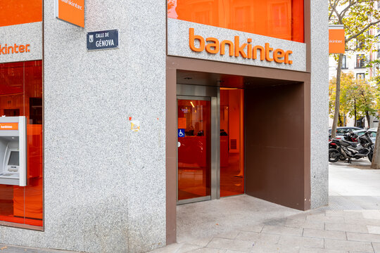 Madrid, spain; 11 05 2025 bankinter bank branch entrance with atm on calle de g&eacute;nova