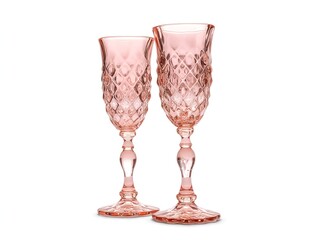 Luxurious crystal goblets featuring intricate gold patterns and opalescent facets glowing in harmony