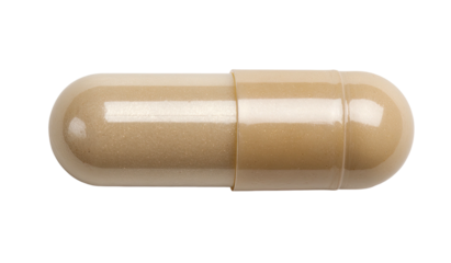 Beige capsule, two halves joined. Medicine or supplement, macro shot