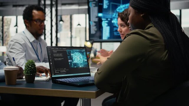 System administrators in startup office brainstorming leverage AI tech to gain competitive edge. . Management executives doing meeting to discuss training machine learning predictive models, camera A