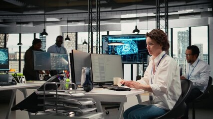 Developer listening music while working in AI startup training predictive models for language processing tasks. Tech expert wearing audio headphones uses technical expertise for IT tasks, camera A