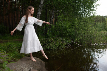 Ethereal Grace: Woman in White Lace Dress by Forest Pond