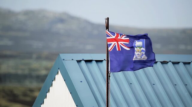 Windy Day With Falkland Islands (Islas Malvinas) Flag Waving on Metal Roof, Port Stanley - 4K