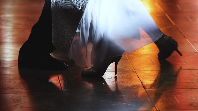 Tangueros couples dancing traditional latin argentinian dance milonga in a ballroom, tango salsa bachata kizomba lesson in red and purple lights, rehearsal evening dance school class festival