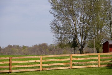 Fototapeta premium A wooden fence in the pasture