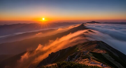 Dramatic alpine sunrise unfolds over a breathtaking mountain ridge, with golden light painting the peaks and wispy clouds gracefully whisking across the rugged terrain