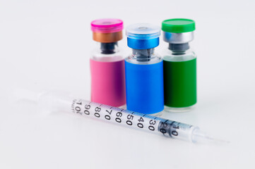 Close up of Glass Vials with Single Use Syringes