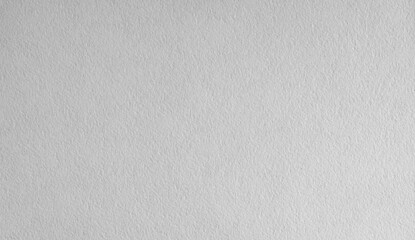 Close up of highly textured, rough cotton watercolor paper background. White cold pressed art sheet surface ideal for painting, drawing, and creative stationery design.