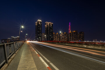 Fototapeta premium August 12, 2024: sunset in District 1, Ho Chi Minh City, Vietnam