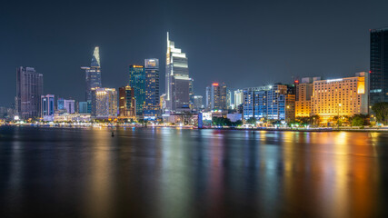 Fototapeta premium August 12, 2024: sunset in District 1, Ho Chi Minh City, Vietnam