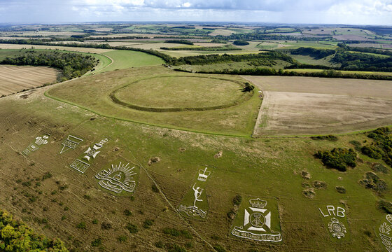 Chiselbury Iron Age Hillfort, Wiltshire. The circular univallate fort is seen above the Fovant Badges. Regimental badges cut into chalk date from WW1